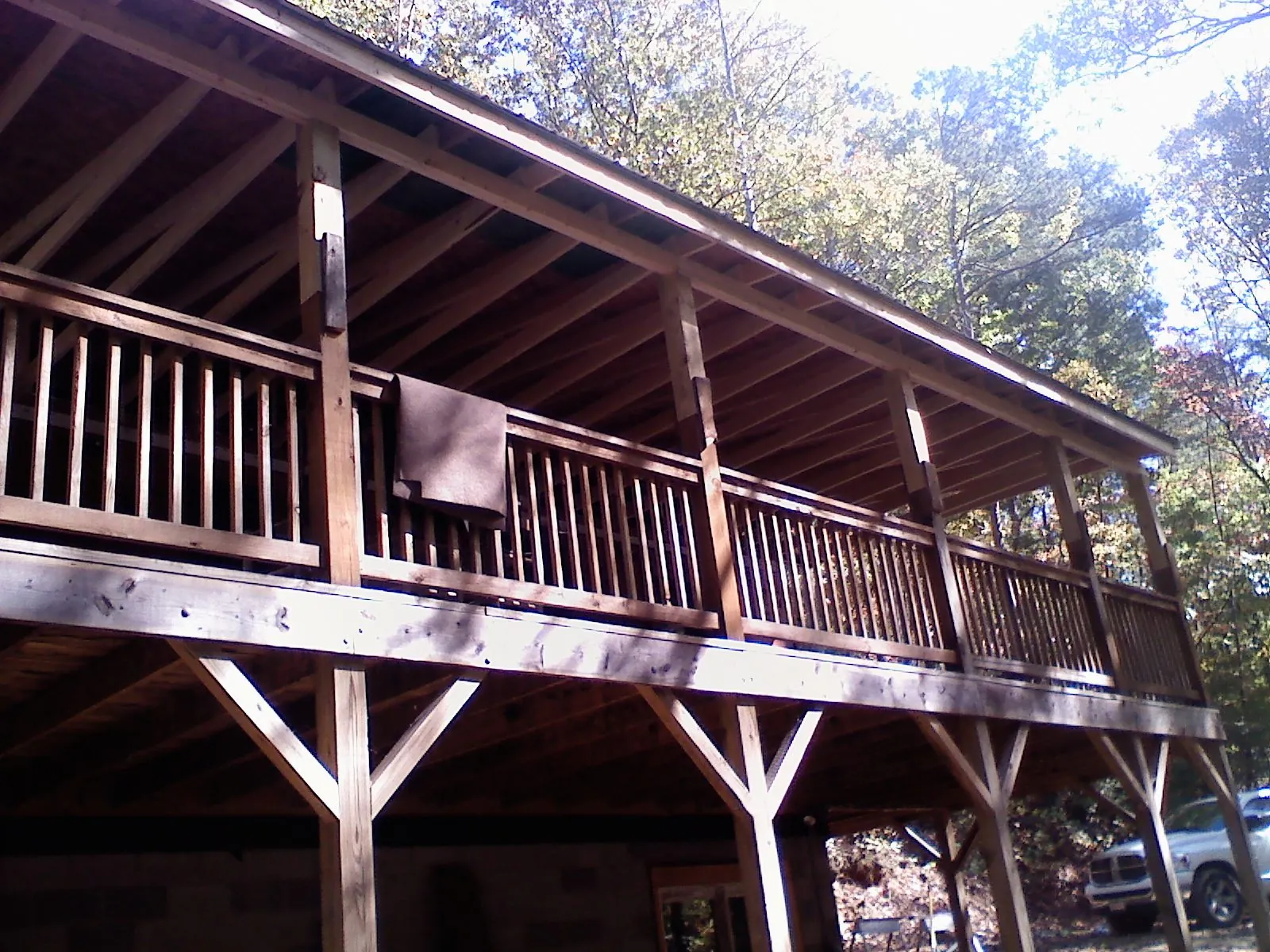 Timber framing under a new elevated porch and deck — Roof Leak Repair in New Alexandria by Roofing Brothers